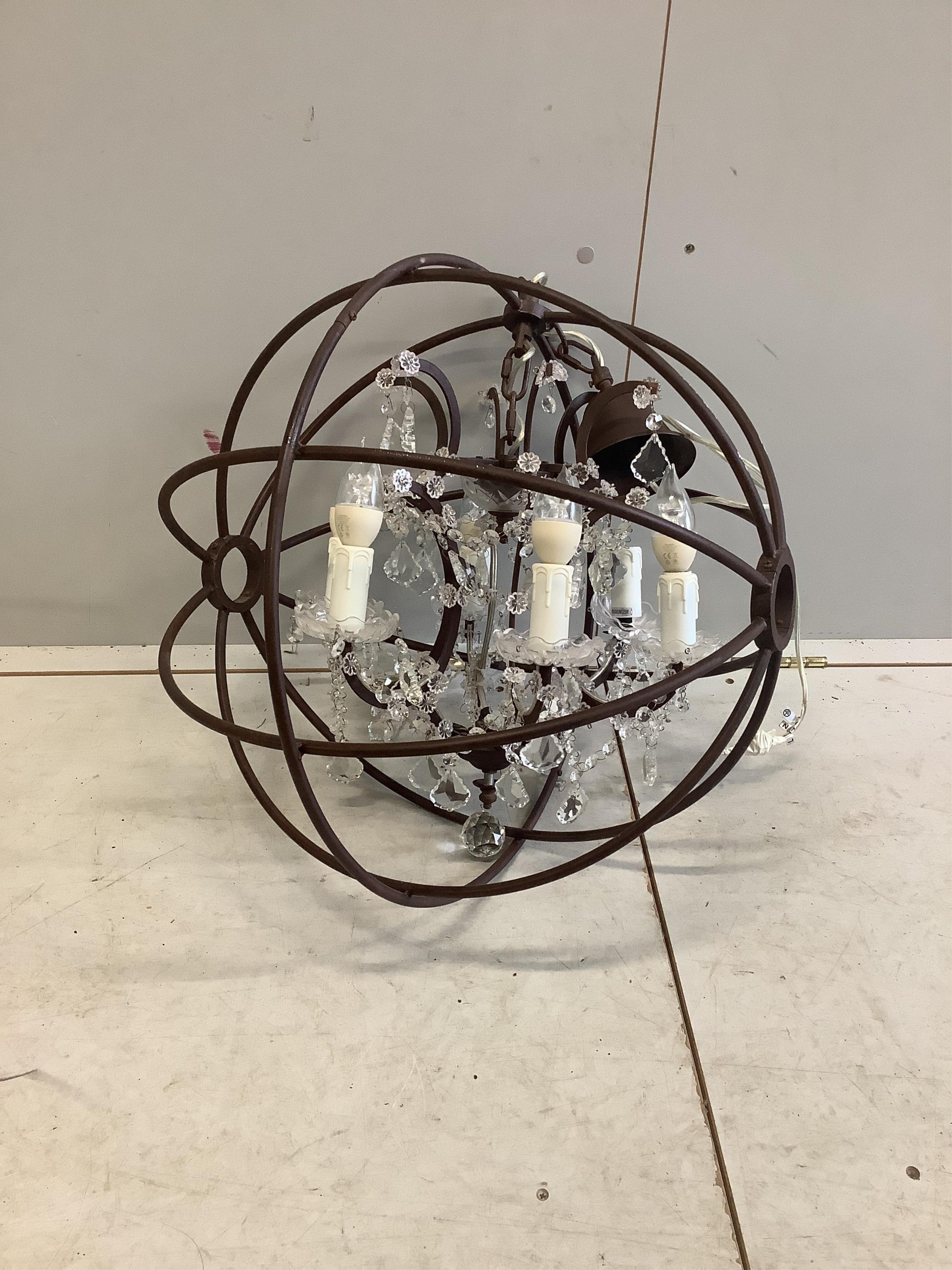 Two large Contemporary metal chandeliers, larger diameter 80cm. Condition - good